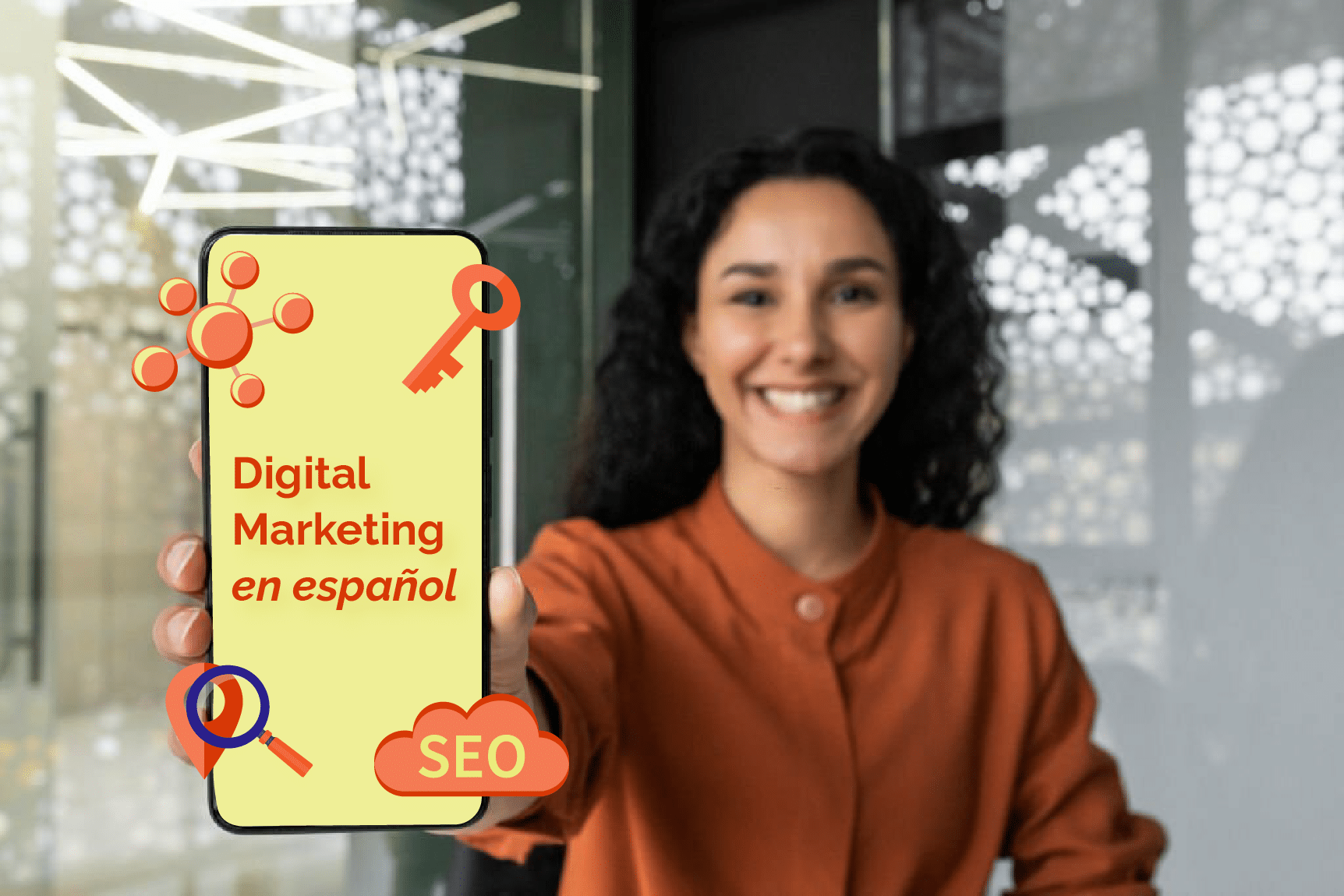 Alpha - Digital Marketing in Spanish - a woman holds a cellphone up
